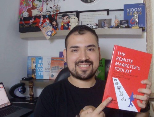 Jorge Alberto Fuentes Zapata holding The Remote Marketer's Toolkit